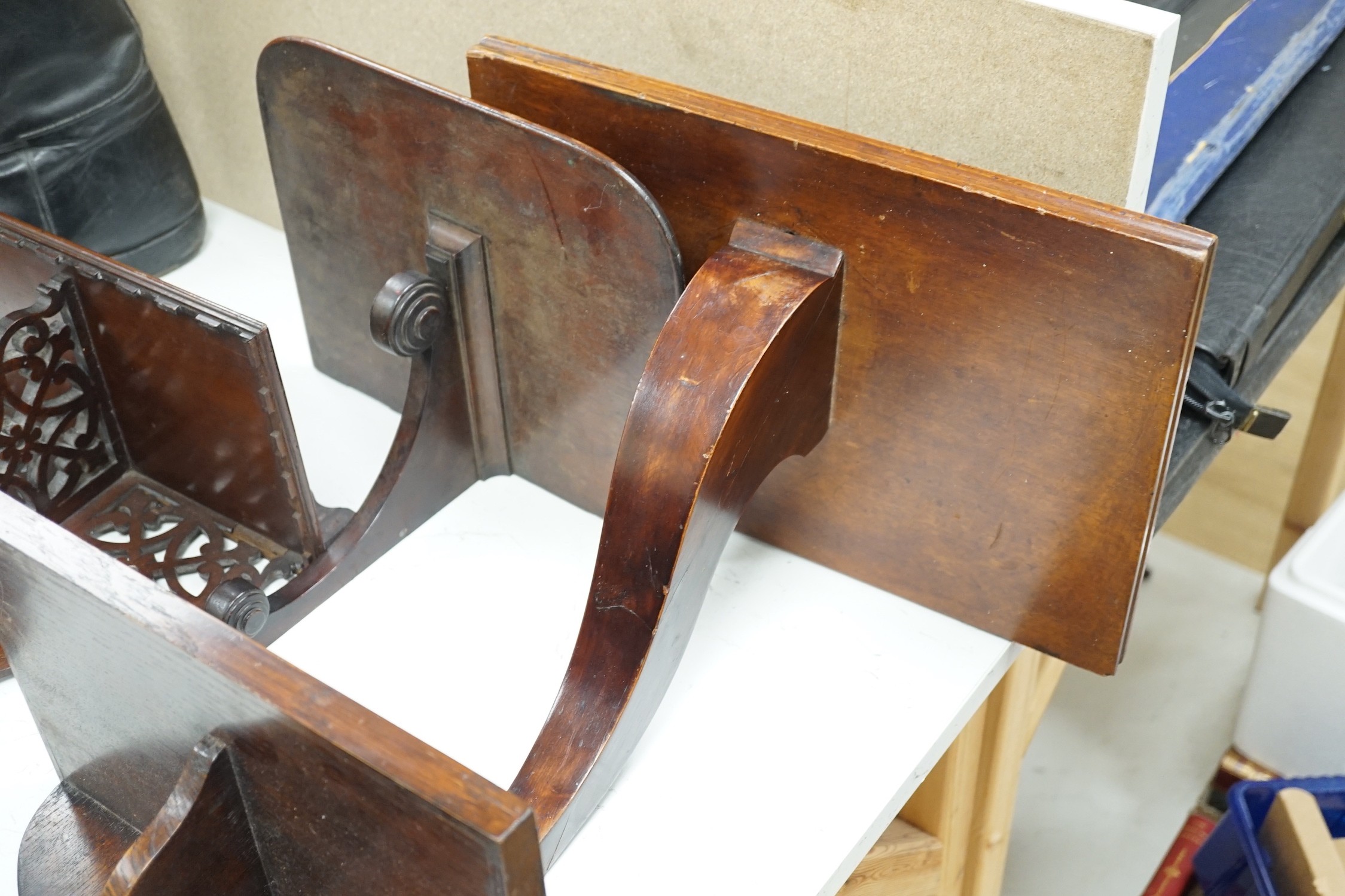 Four carved mahogany or oak wall brackets, largest 34x39cm